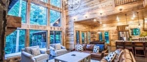 Knotty by Nature cabin living room and kitchen